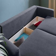 Funktionssofa mit geöffneter Stauraumfunktion, seitliche Perspektive
