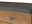 Nahaufnahme einer Küchenschublade mit Holzoptik und einer dunklen Arbeitsplatte, seitliche Perspektive.