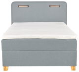 Frontale Ansicht eines grauen Boxbetts mit Holzfüßen und gepolstertem Kopfteil.