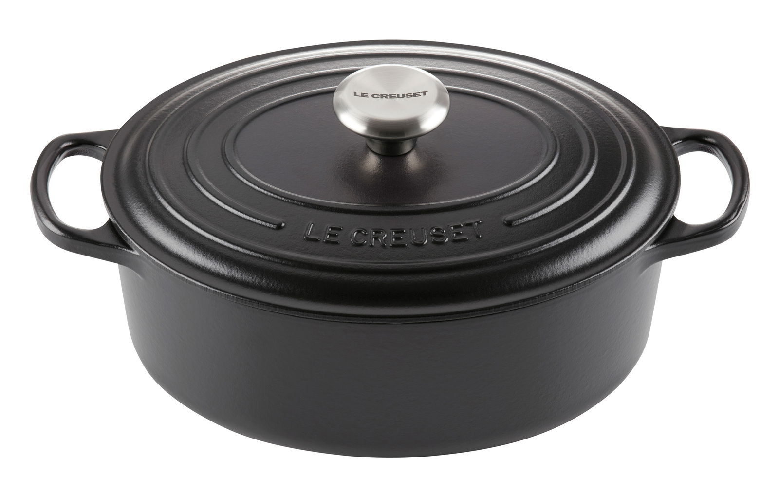 Schwarzer Bräter von Le Creuset, oval, 29 cm, mit Deckel und seitlichen Griffen, aus leicht erhöhter Perspektive.