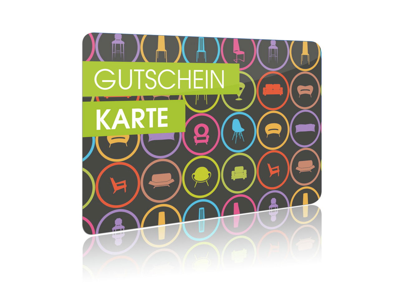 Geschenkgutschein im Wert von 50 Euro mit bunten Möbel-Symbolen auf dunklem Hintergrund, perspektivisch leicht von der Seite gezeigt.