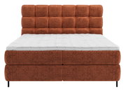 Boxspringbett in Rostrot mit gepolstertem Kopfteil, Frontalansicht