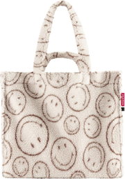 Frontansicht einer cremefarbenen, flauschigen Teddy-Shopper-Tasche mit braunem Smileys-Print und zwei kurzen Tragehenkeln vor weißem Hintergrund