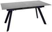 Moderner Esstisch mit grauer Tischplatte und schwarzen, schrägen Beinen, seitliche Perspektive