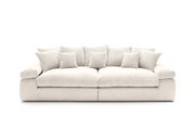 Großes, cremefarbenes Big-Sofa mit mehreren Kissen, Vorderansicht
