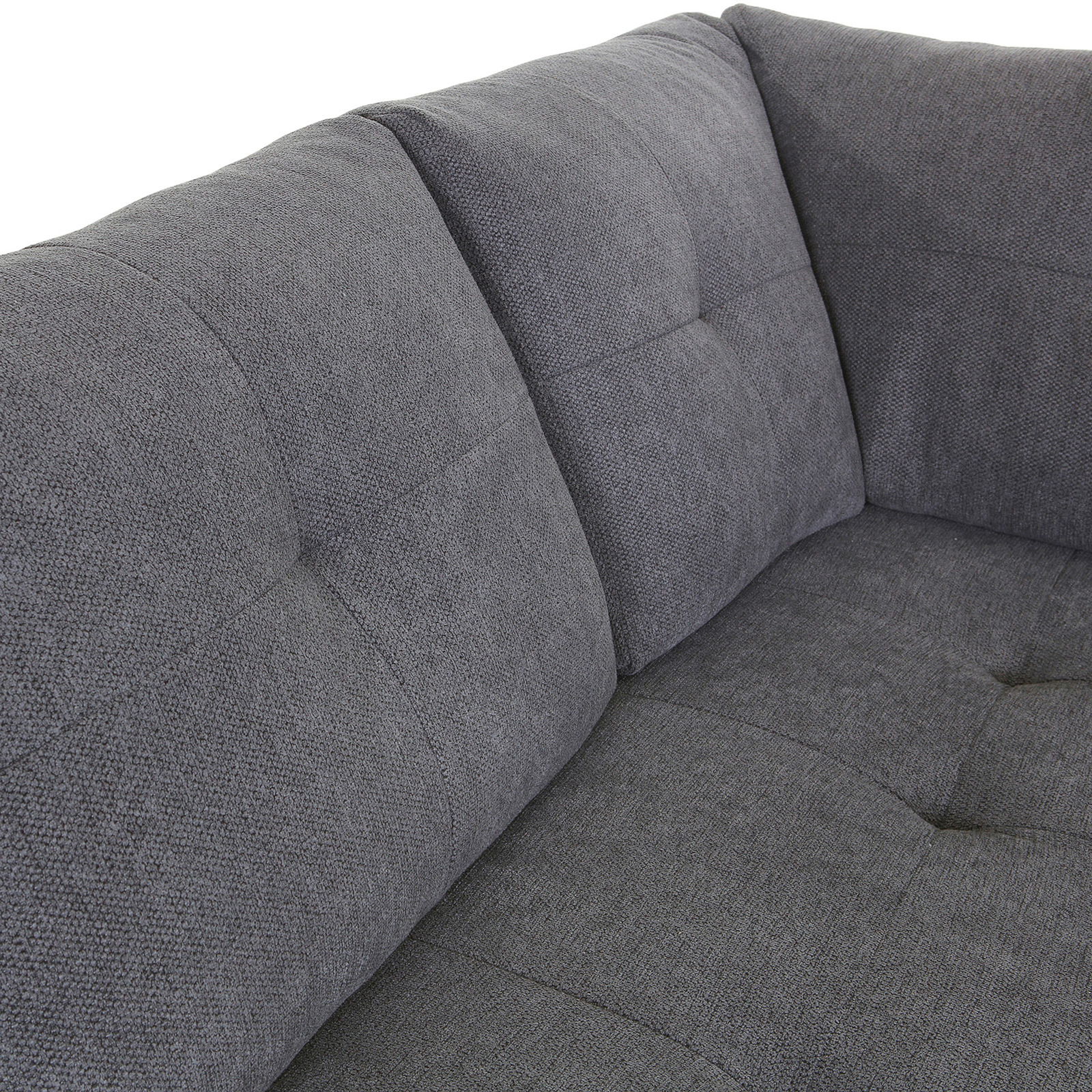 Graues Ecksofa MAURIS mit weicher Polsterung, Nahaufnahme der Rückenlehne aus schräger Perspektive.