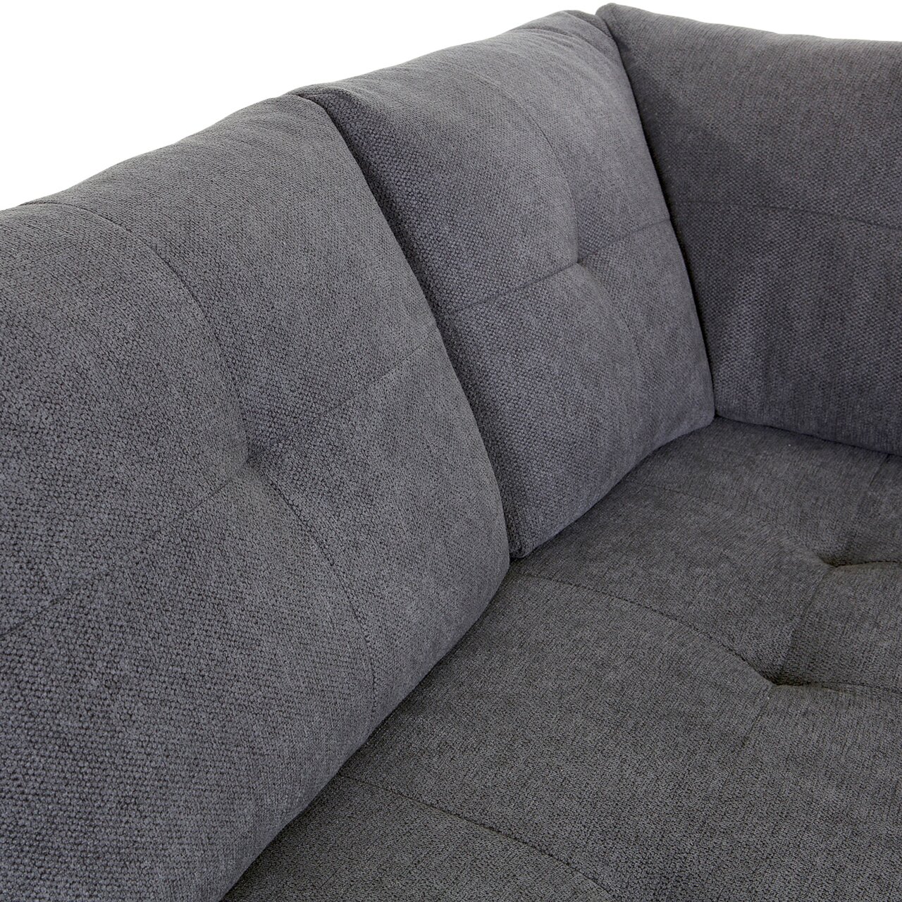 Graues Ecksofa MAURIS mit weicher Polsterung, Nahaufnahme der Rückenlehne aus schräger Perspektive.