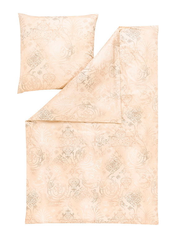 Bettwäsche-Set in Beige mit elegantem, floralen Muster, bestehend aus einem Kissenbezug und einem Bettdeckenbezug, aus der Vogelperspektive fotografiert.