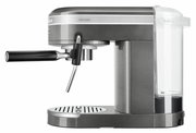 Seitliche Ansicht einer Edelstahl-Espressomaschine mit Dampfdüse und abnehmbarem Wassertank.