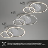 Moderne LED Deckenleuchte mit LEDDots, von unten betrachtet, zeigt drei unterschiedlich große, leuchtende Ringe und separate LED-Punkte, die über einen Wandschalter gesteuert werden können.