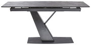 Moderner Esstisch mit grauer Tischplatte und einzigartigem V-förmigem Metallgestell, seitliche Perspektive.