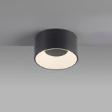 Moderne Deckenleuchte TANIKA in zylindrischer Form, schwarze Oberfläche, von unten betrachtet.