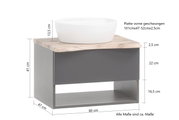 Waschtisch-Set mit weißem Aufsatzbecken auf einer geschwungenen Holzplatte, grauer Unterschrank mit offener Ablage, seitliche Perspektive