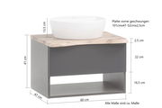 Waschtisch-Set mit weißem Aufsatzbecken auf einer geschwungenen Holzplatte, grauer Unterschrank mit offener Ablage, seitliche Perspektive