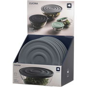 Silikondeckel in Anthrazit, präsentiert in einer Verkaufsverpackung, von schräg oben fotografiert.