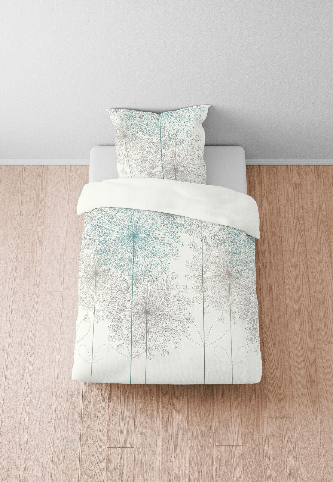 Bettwäsche-Set 135x200cm mit floralem Muster in Vogelperspektive auf einem Holzboden