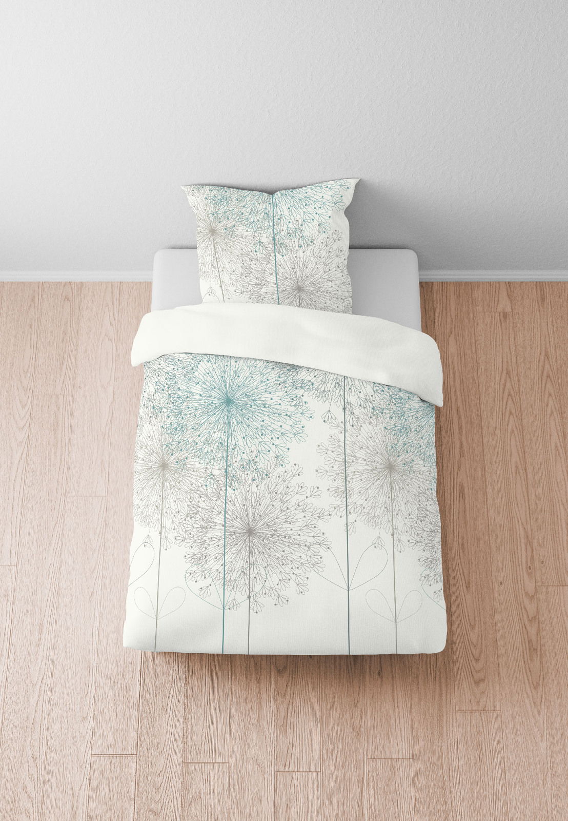 Bettwäsche-Set 135x200cm mit floralem Muster in Vogelperspektive auf einem Holzboden