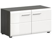 Moderne Sitzbank mit weißer Front und dunkler Holzoberfläche, seitliche Perspektive