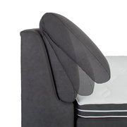 Seitliche Ansicht eines Boxspringbetts 180x200 H3/H3 mit verstellbarem Kopfteil in dunklem Stoffbezug.