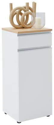 Weiße Kombi-Kommode mit Holzplatte, dekoriert mit einer modernen Skulptur und einer Kerze in einem Glas, seitliche Perspektive