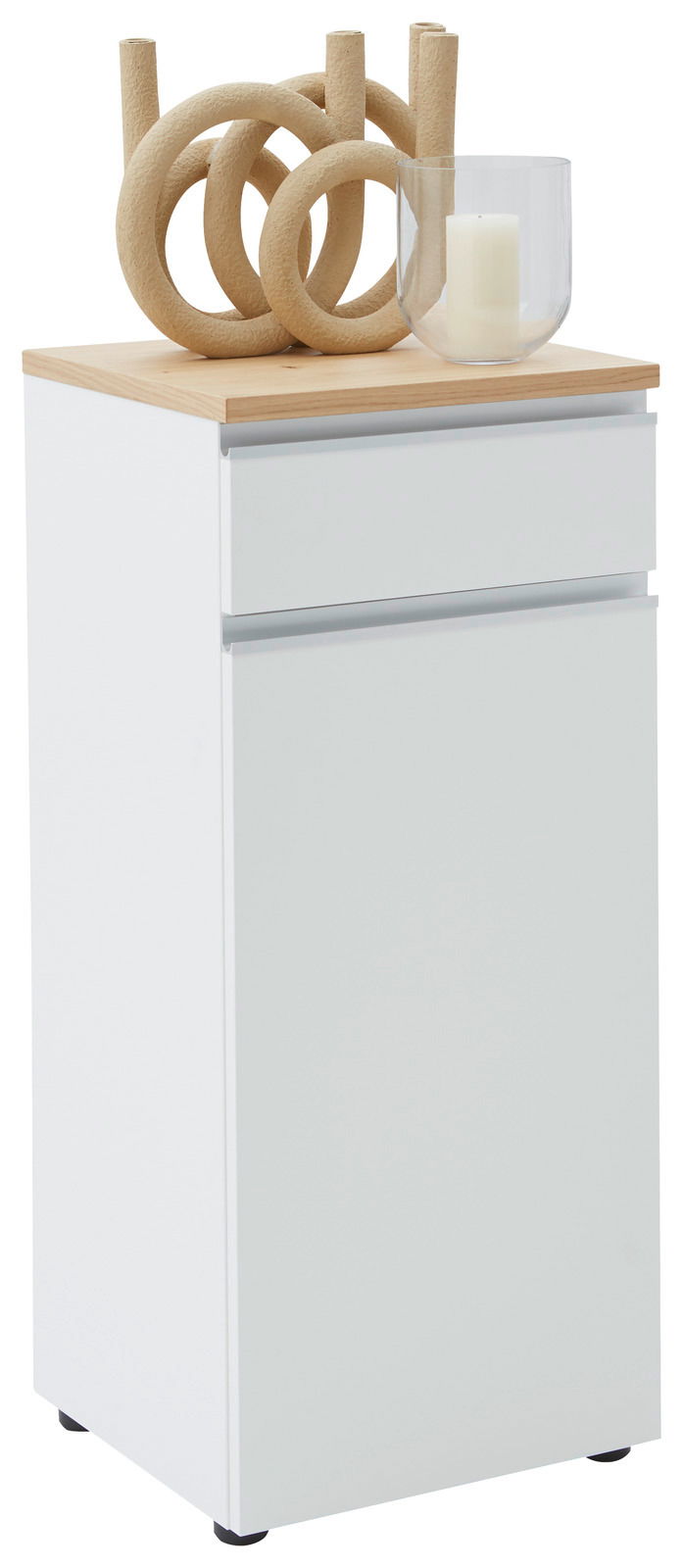 Weiße Kombi-Kommode mit Holzplatte, dekoriert mit einer modernen Skulptur und einer Kerze in einem Glas, seitliche Perspektive