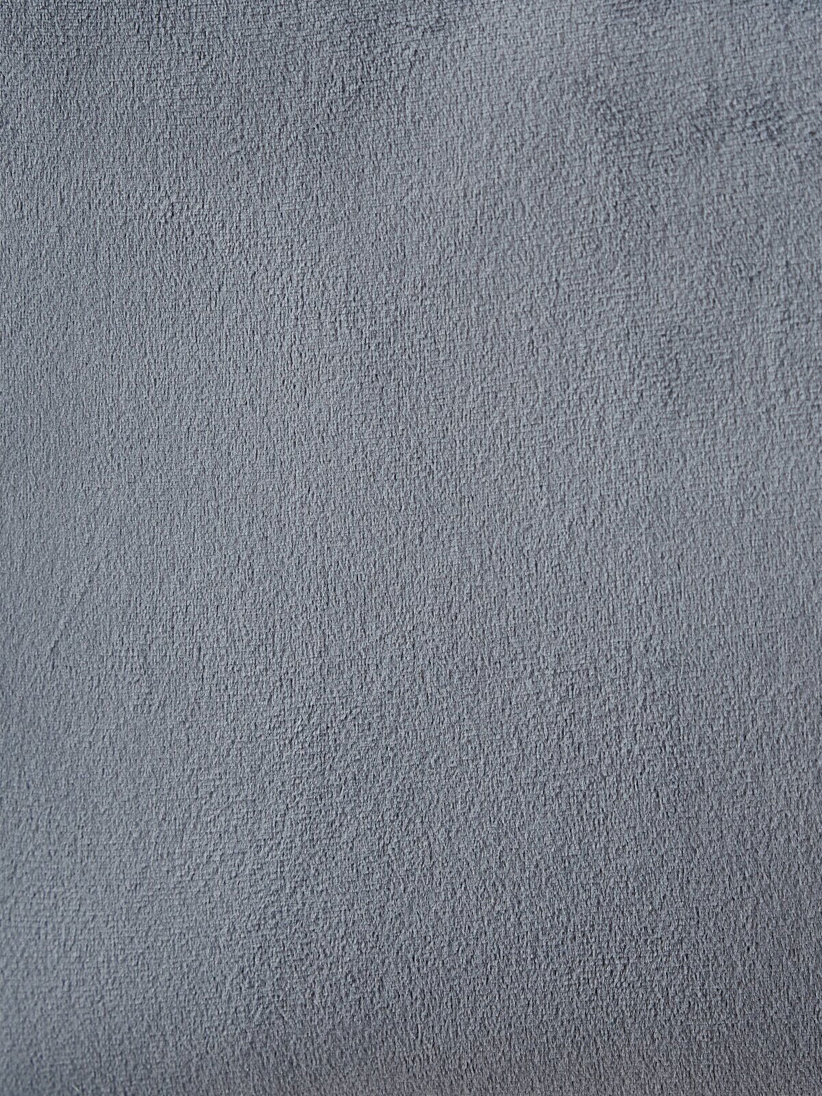 Ti´me Armlehnstuhl CARSTEN Nahaufnahme einer grauen Stofftextur, möglicherweise Polsterung eines Armlehnstuhls