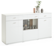 Weißes Sideboard mit Schubladen und Glaseinsatz, dekoriert mit Pflanzen und Vasen, seitliche Perspektive