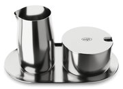 Elegantes Milch- und Zucker-Set aus Edelstahl, bestehend aus einem Krug und einer Zuckerdose mit Deckel, auf einem Tablett. Ansicht von oben.