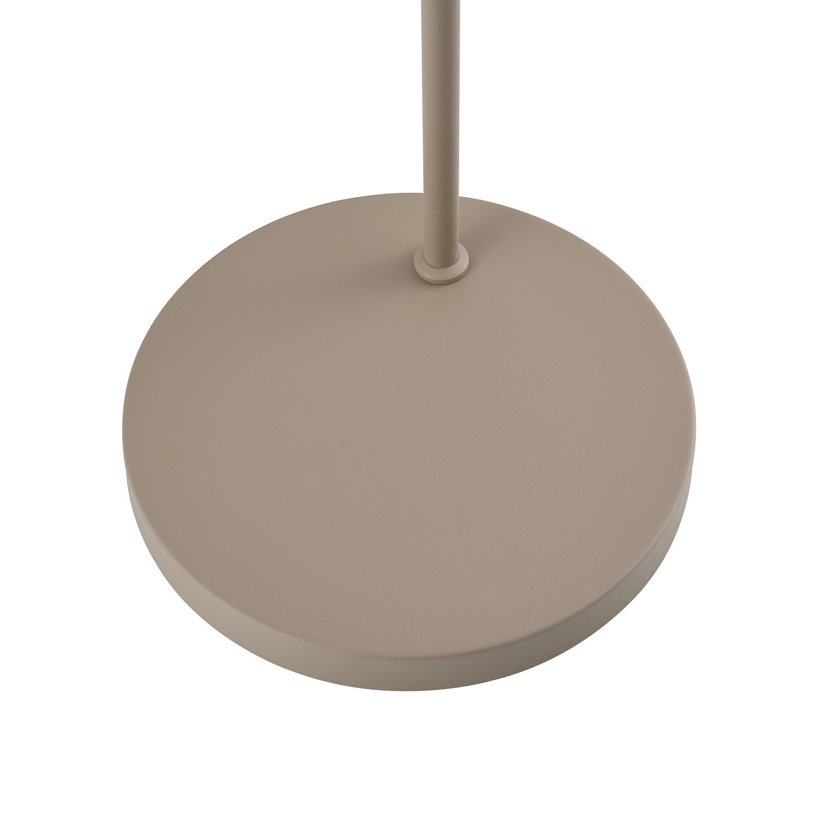 Nahaufnahme der Basis einer Stehleuchte in beige aus der Vogelperspektive.