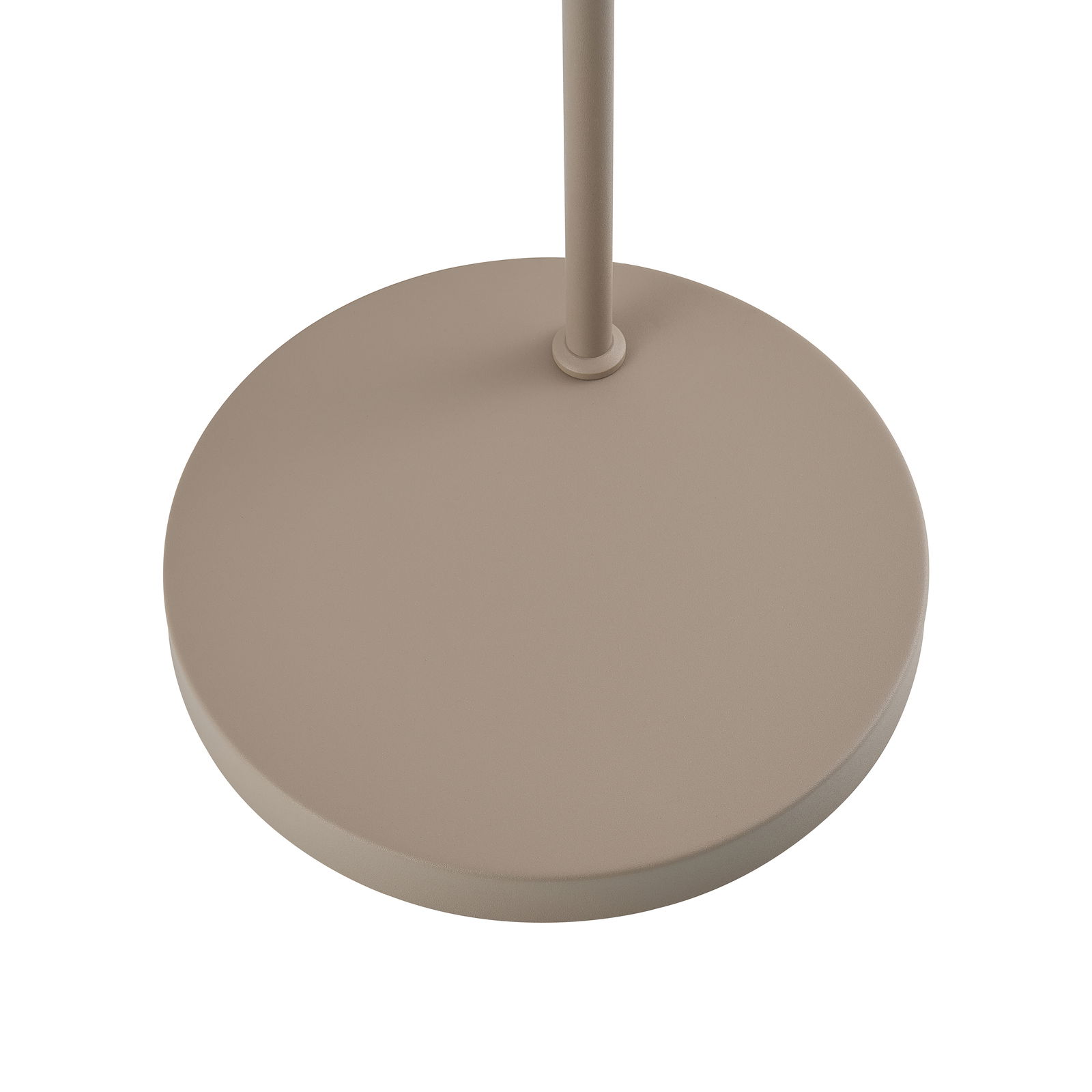 Nahaufnahme der Basis einer Stehleuchte in beige aus der Vogelperspektive.