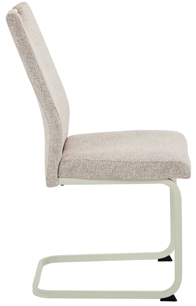Seitenansicht eines beige gepolsterten Schwingstuhls mit Metallgestell.