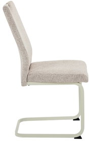 Seitenansicht eines beige gepolsterten Schwingstuhls mit Metallgestell.