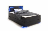 Boxspringbett mit LED-Beleuchtung, seitliche Perspektive