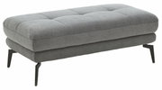 Grauer XXL-Hocker mit gepolsterter Sitzfläche und schwarzen Metallbeinen, seitliche Perspektive