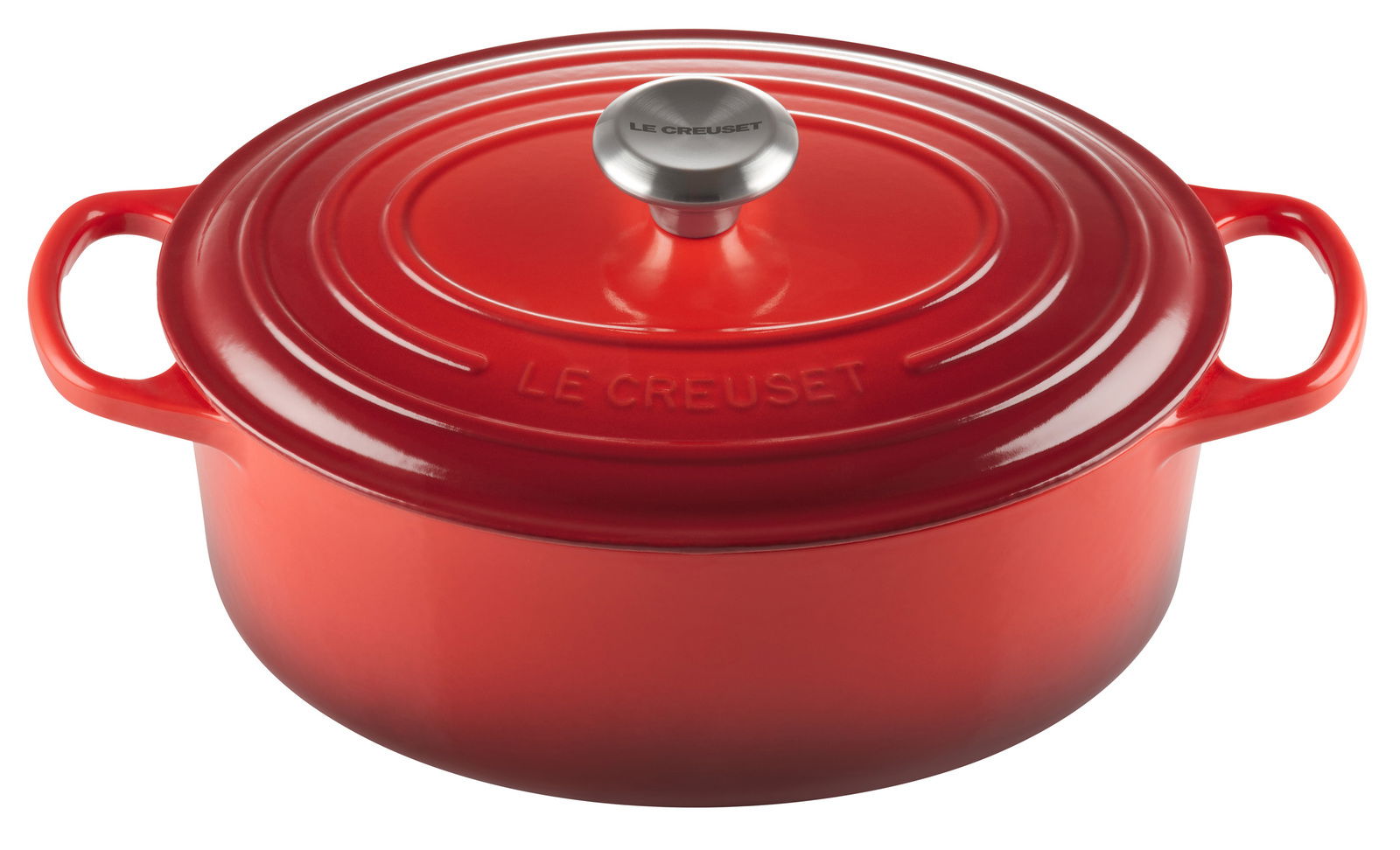 Roter ovaler Bräter von Le Creuset mit Deckel und seitlichen Griffen, Ansicht von schräg oben.