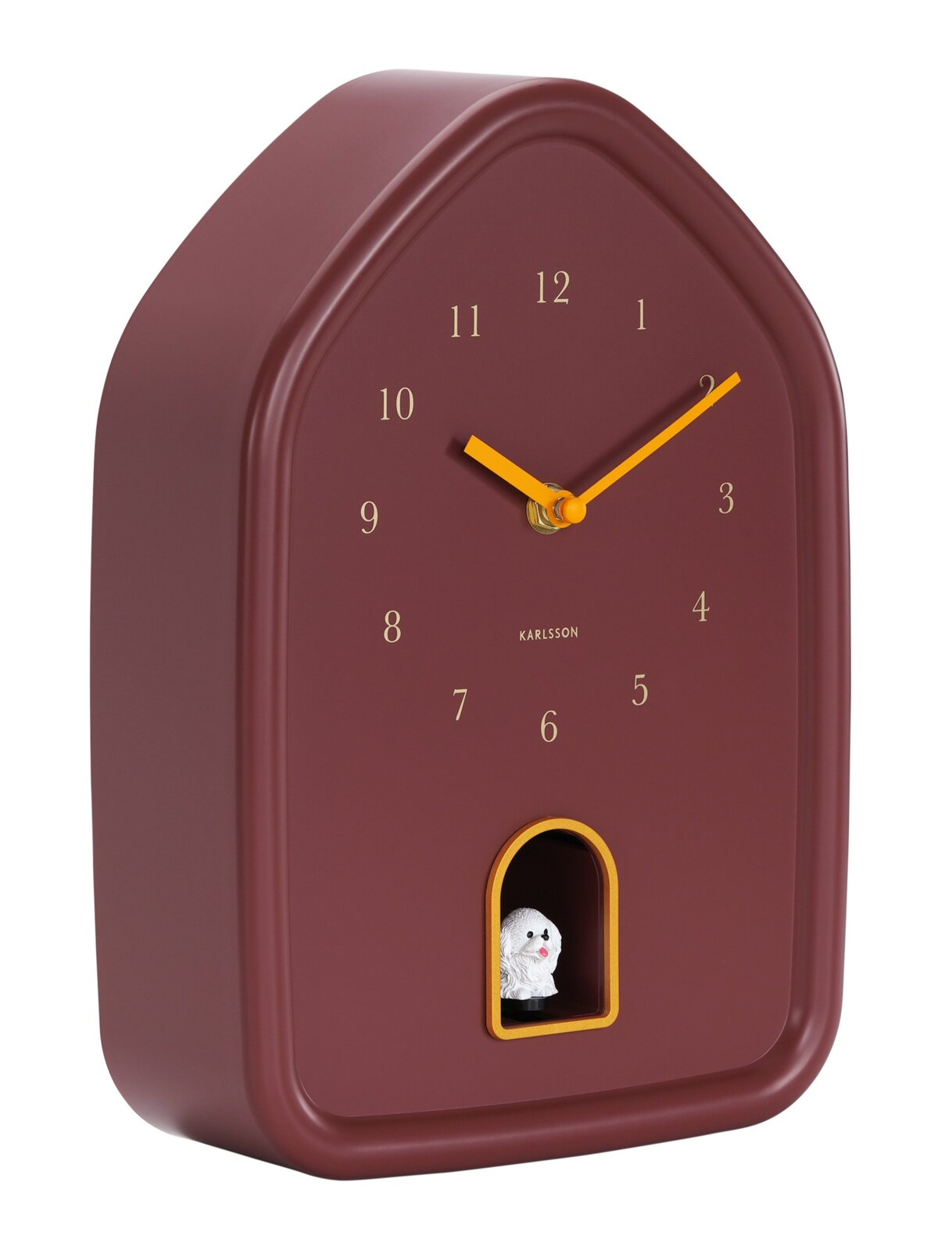 Seitliche Ansicht einer burgunderroten Wanduhr mit gelben Zeigern und einer kleinen Figur in einer unteren Öffnung.