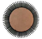 Rückansicht eines runden Spiegels mit einem dekorativen schwarzen Rahmen in Sonnenstrahlen-Design.
