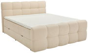 Beiges Boxbett mit gepolstertem Kopfteil und seitlicher Perspektive