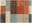 Frisé-Teppich mit geometrischem Muster in Rot-, Braun- und Beigetönen, Draufsicht